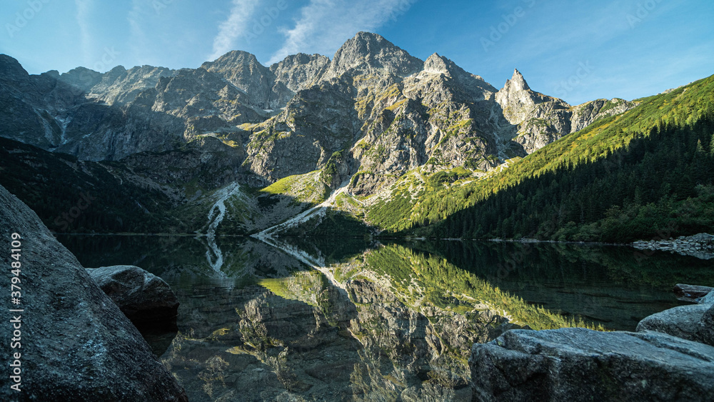 lake between mountains