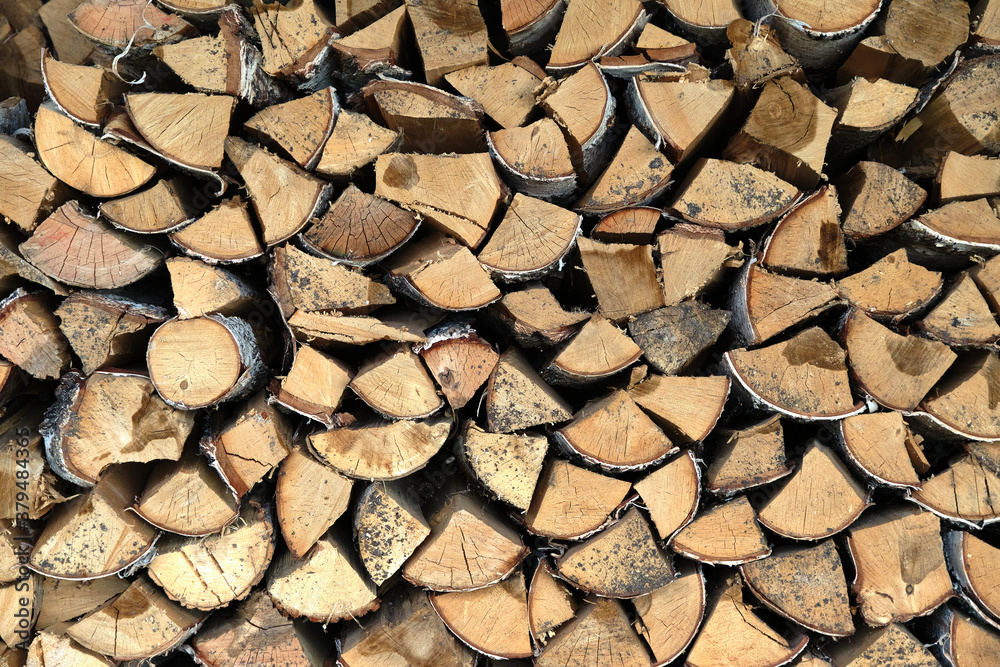 ackground of dry chopped firewood