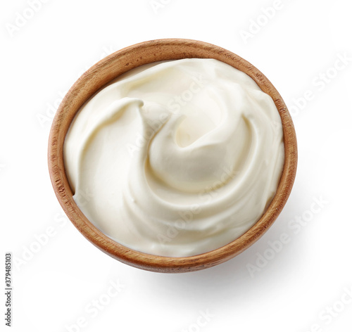 wooden bowl of whipped yogurt cream