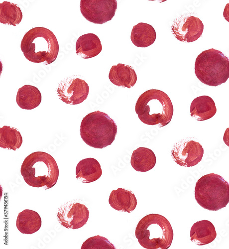 pattern in polka dots and circles painted with bronze paint similar to traces of lipstick for design surfaces