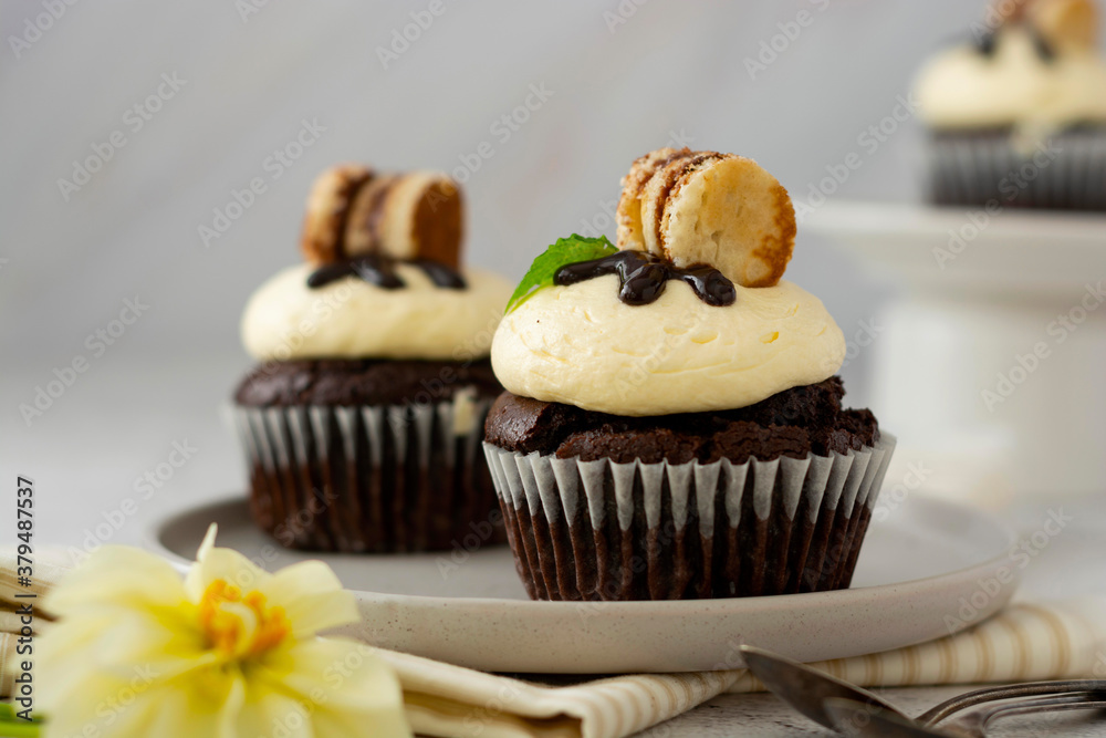 Delicious chocolate cupcake with vanilla butter cream. Delicious chocolate cupcake with vanilla butter cream.