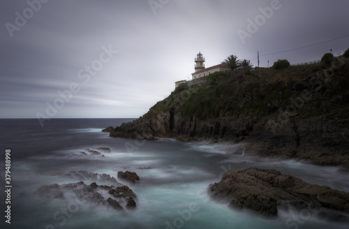 Cudillero lighthouse, rainy day