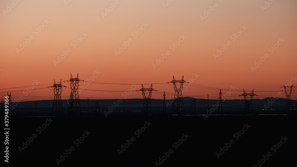 power lines at sunset silhouette