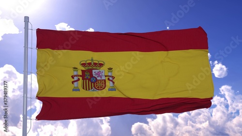 Spanish flag fluttering in the wind. National flag against a blue sky. 3d rendering photo
