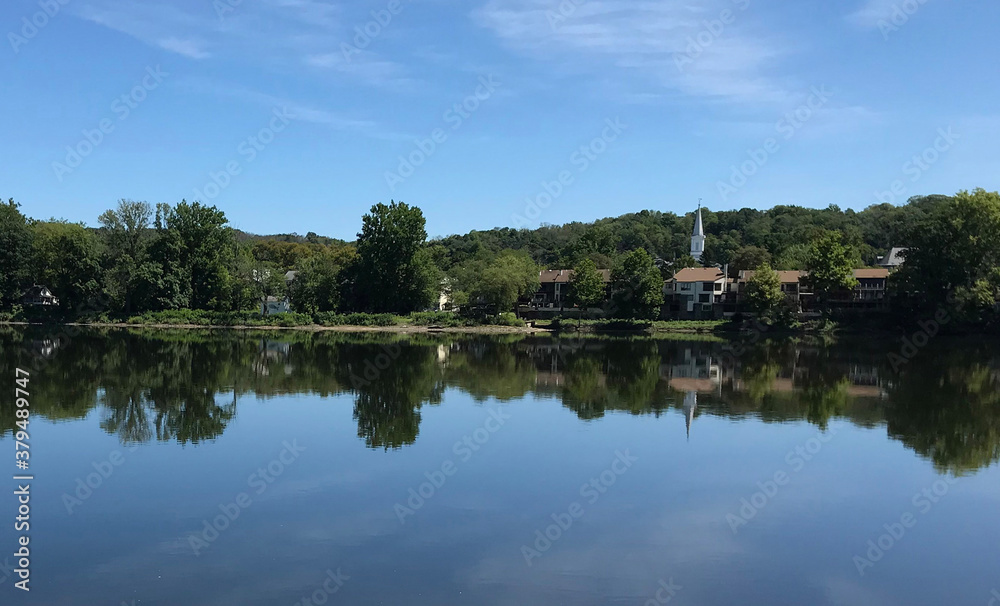 Church spire reflected in the Delaware River