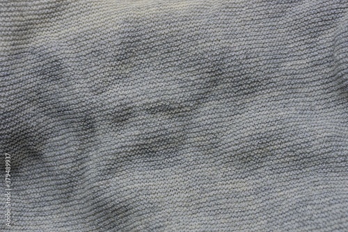 gray fabric texture from a piece of wool matter on the cloth