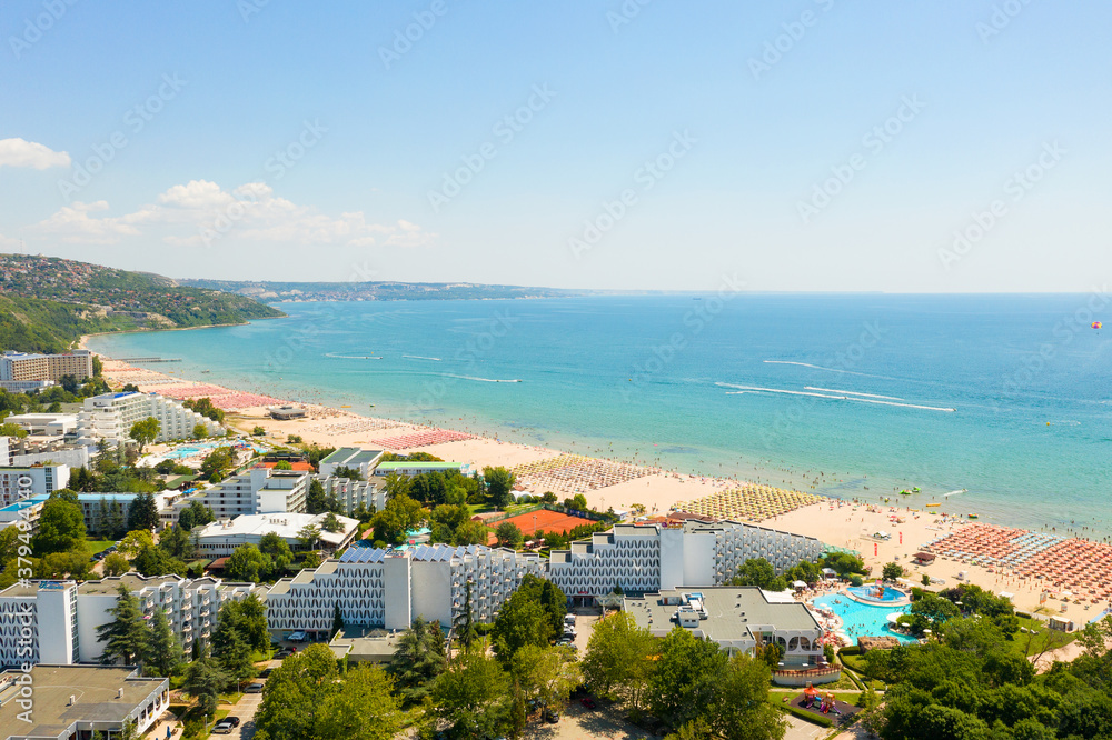 Obraz premium Albena, Bulgaria - July 26, 2019: Aquapark view from above, people relaxing on a summer day. Aerial image a drone. Travel and vacation concept.