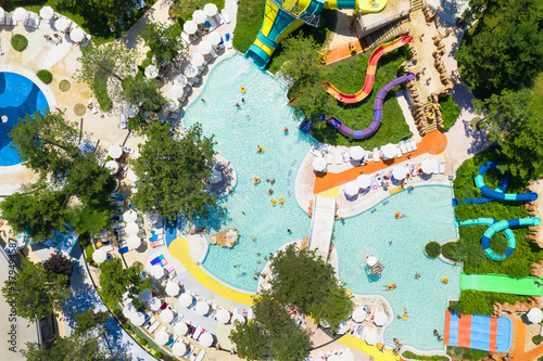 Albena  Bulgaria - July 26  2019  Aquapark view from above  people relaxing on a summer day. Aerial image a drone. Travel and vacation concept.