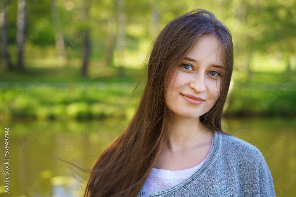 Portrait of a girl on a lake background Portrait of a girl on a lake background