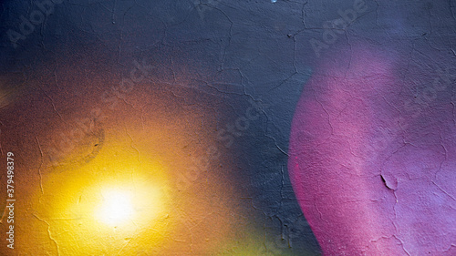 Abstract creative background of chaotic strokes of old cracked paint on concrete wall. Old surface with traces of paint, weathered, scratches and cracks for design