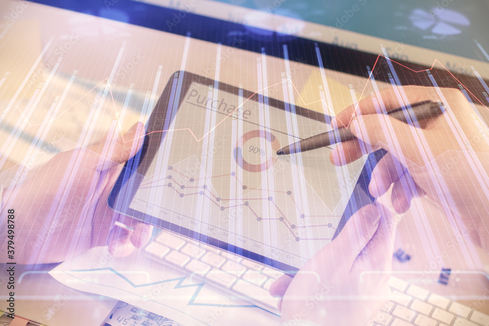 Double exposure of man's hands holding and using a phone and financial chart drawing. Market analysis concept. Double exposure of man's hands holding and using a phone and financial chart drawing. Market analysis concept.