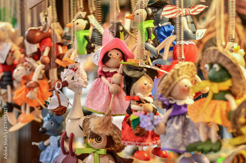 Colorful marionette witches for sale on the streets of Prague. Selective focus. © kyrychukvitaliy