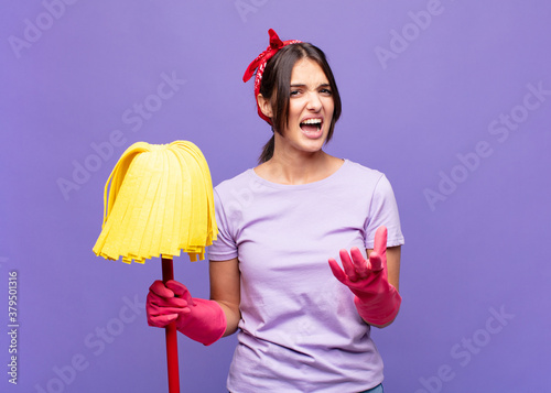 Obraz na plátně young pretty woman looking desperate and frustrated, stressed, unhappy and annoy