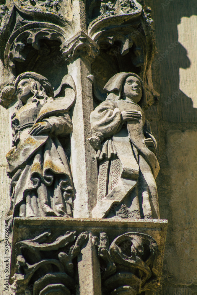 View of the exterior facade of the Basilica of Saint-Remi, a medieval abbey church in Reims, a historical monument in the Grand Est region of France
View of the exterior facade of the Basilica of Saint-Remi, a medieval abbey church in Reims, a historical monument in the Grand Est region of France