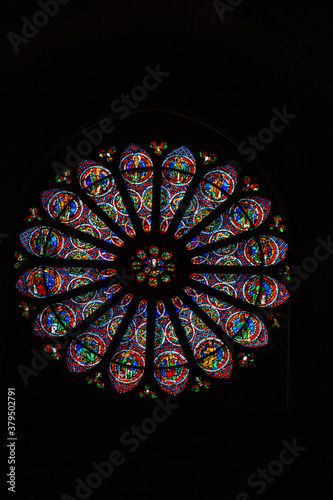View of stained glass windows inside the Basilica of Saint-Remi, a medieval abbey church in Reims, a historical monument in the Grand Est region of France 