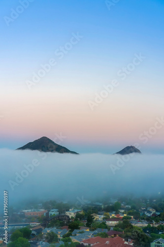 Mountain Peaks above the Layer of Clouds, Fog