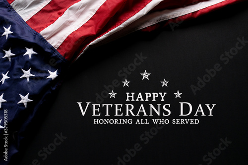 Happy Veterans Day. American flag on black background with copy space.