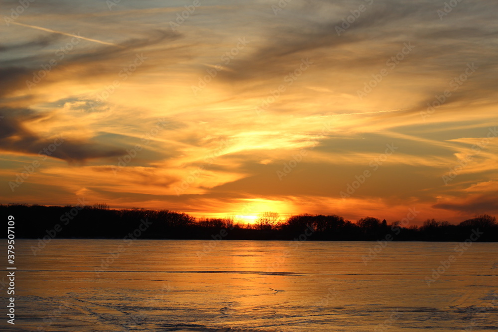 Sunset over a Frozen Lake