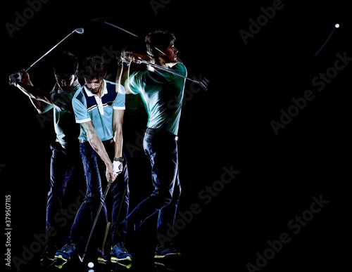 one caucasian young golfer man golfing golf swing isolated on black background with multiple exposure photo
