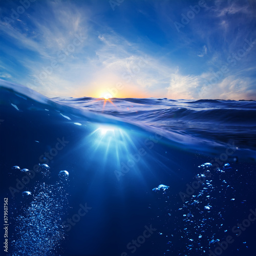 Photos design template with underwater part and sunset skylight splitted by waterline