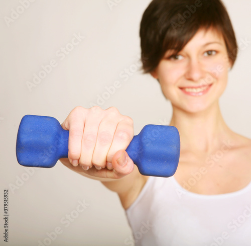 fitness woman lifting weights