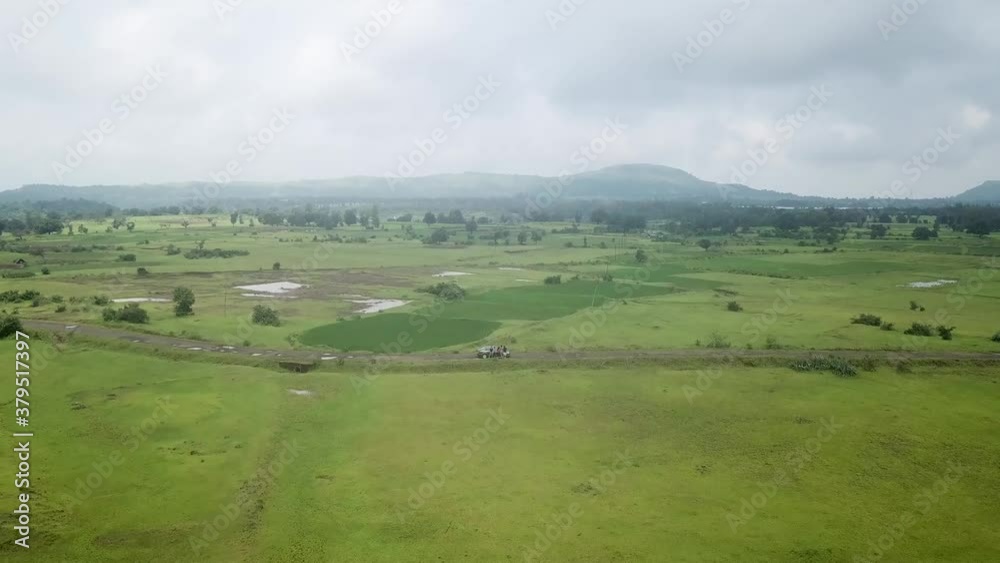 Drone Flying Above The Vast Green Field In Trimbakeshwar, A Religious Town In Maharashtra, India - aerial Drone Flying Above The Vast Green Field In Trimbakeshwar, A Religious Town In Maharashtra, India - aerial