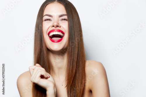 Woman laughs with narrowed eyes long hairstyle attractive Copy space