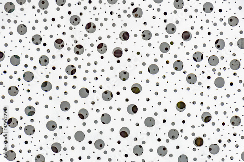 Obraz na płótnie Textured background, white iron plate with holes w salonie
