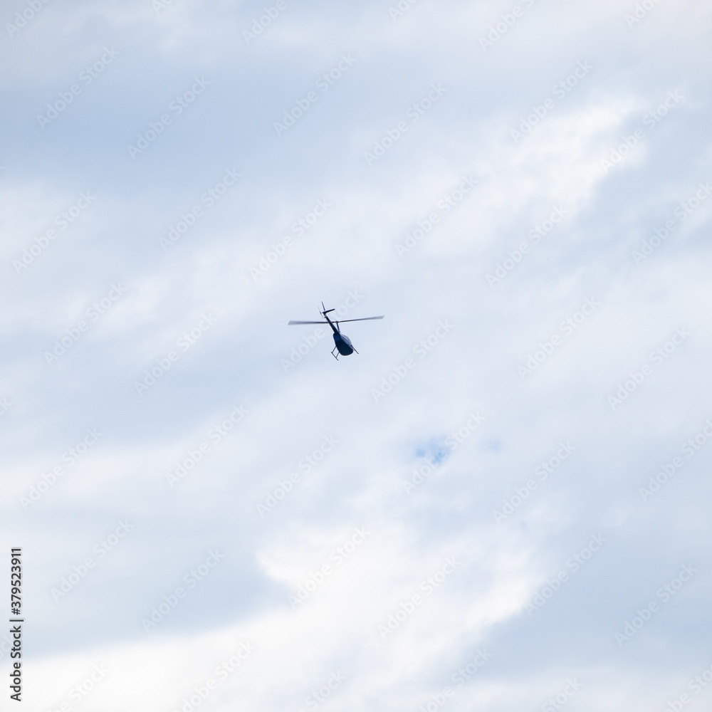 Helicopter flying high over Sydney harbour Australia Helicopter flying high over Sydney harbour Australia