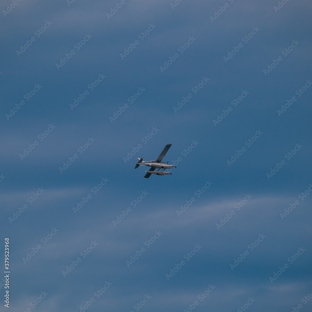 Sea plane flying high above Sydney Harbour Australia Sea plane flying high above Sydney Harbour Australia