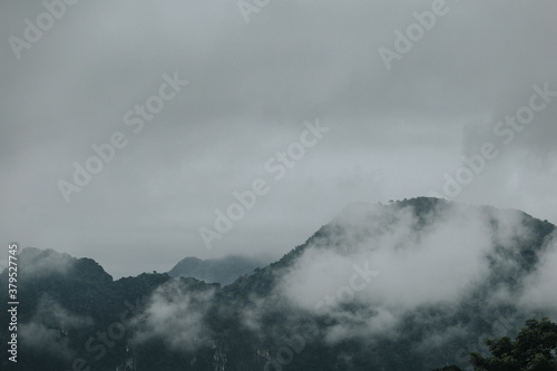 Misty mountains landscape in the morning