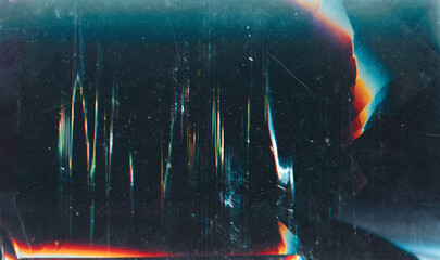 Grunge abstract background. Damaged screen. Orange glitch noise on blue scratched texture with dust.
