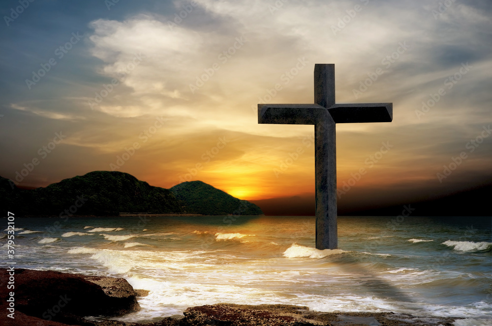 Crucifix crucifixion jesus christ at sea with sunset background