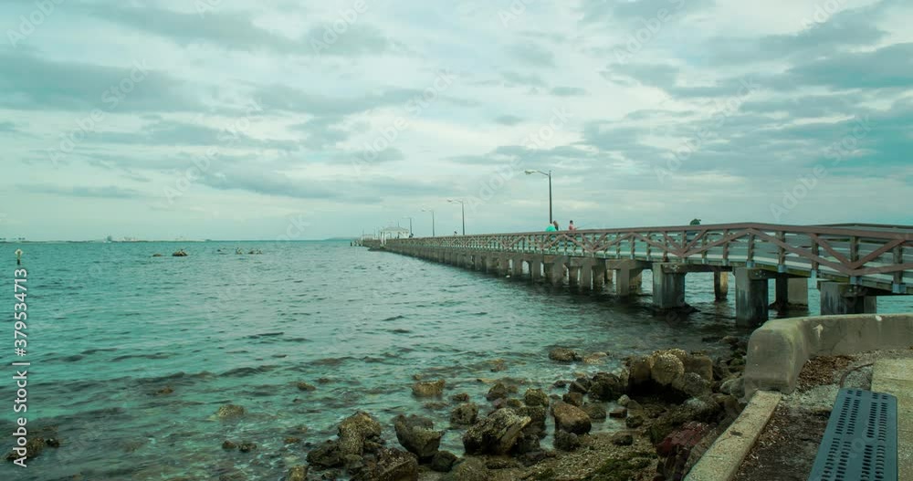 Tide coming in around fishing pier in Tampa Bay time lapse Tide coming in around fishing pier in Tampa Bay time lapse