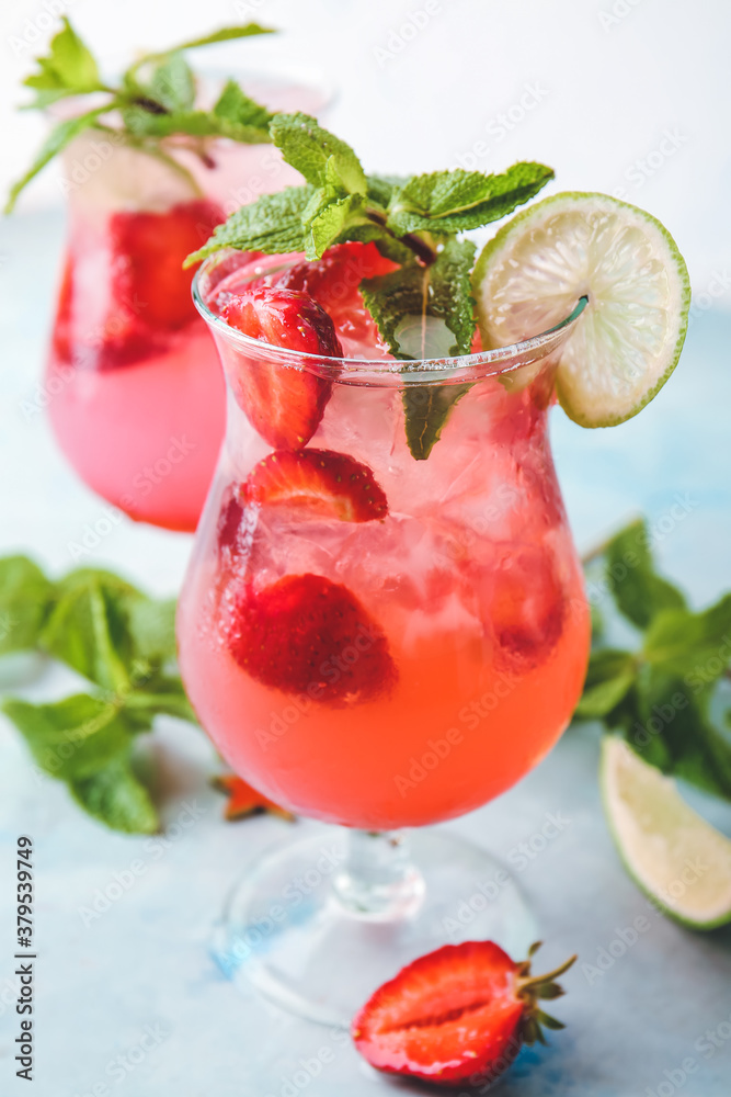 Glass of fresh strawberry mojito on color background Glass of fresh strawberry mojito on color background