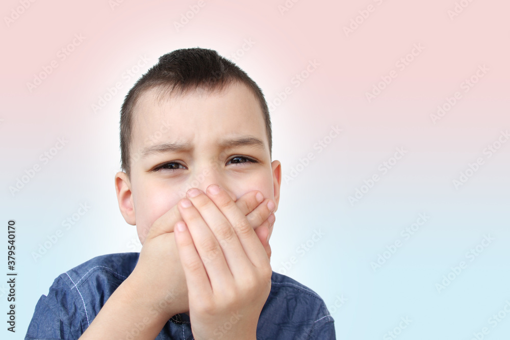 kid, schoolboy holds his hands on the lower jaw, wrinkles from toothache, the concept of pediatric dentistry, treatment of milk teeth, oral care kid, schoolboy holds his hands on the lower jaw, wrinkles from toothache, the concept of pediatric dentistry, treatment of milk teeth, oral care