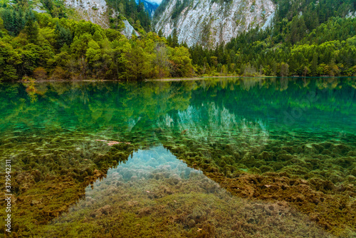 The beautiful turquoise water in ,lakes with forest in Jiuzhai Valley, in Sichuan, China, summer time.