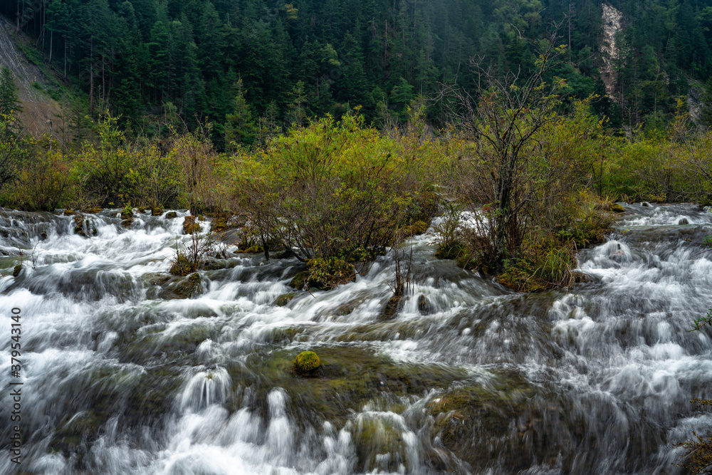 The small waterfalls at pearl beach, in Jiuzhai Valley Park, Sichuan, China. The small waterfalls at pearl beach, in Jiuzhai Valley Park, Sichuan, China.