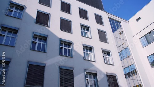 Wallpaper Mural Office building in sunlight. The place of work of the staff in the office space. The camera moves in a circle, windows and shadows are visible. Torontodigital.ca