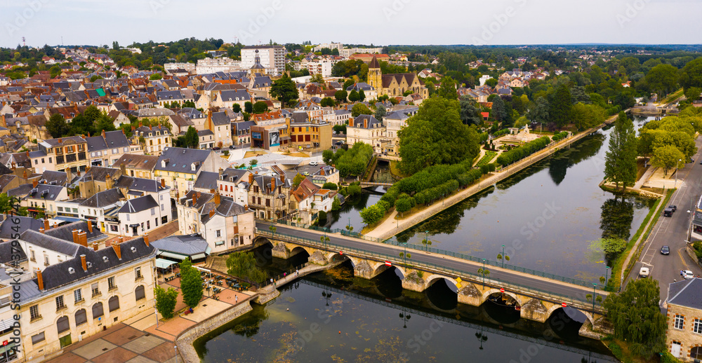 View from drone of houses and Cher river at Vierzon town at summer day, France