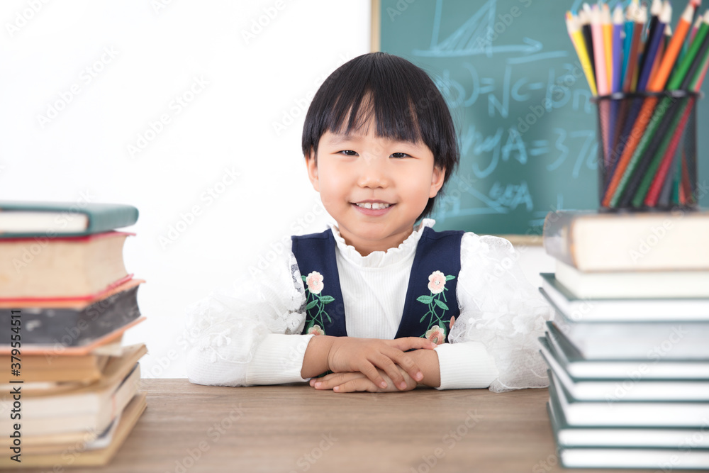 Little girl sitting on the board Little girl sitting on the board
