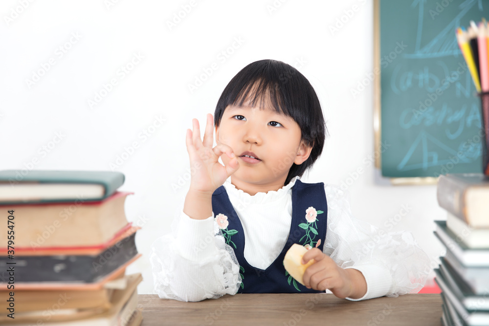 Little girl with OK gesture Little girl with OK gesture