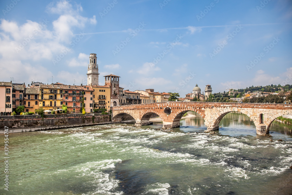 Beautiful view of the Ponte Pietra (Italian for 