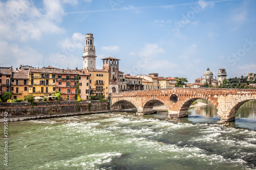 Beautiful view of the Ponte Pietra (Italian for "Stone Bridge"), once known as the Pons Marmoreus, is a Roman arch bridge crossing the Adige River in Verona, Italy.