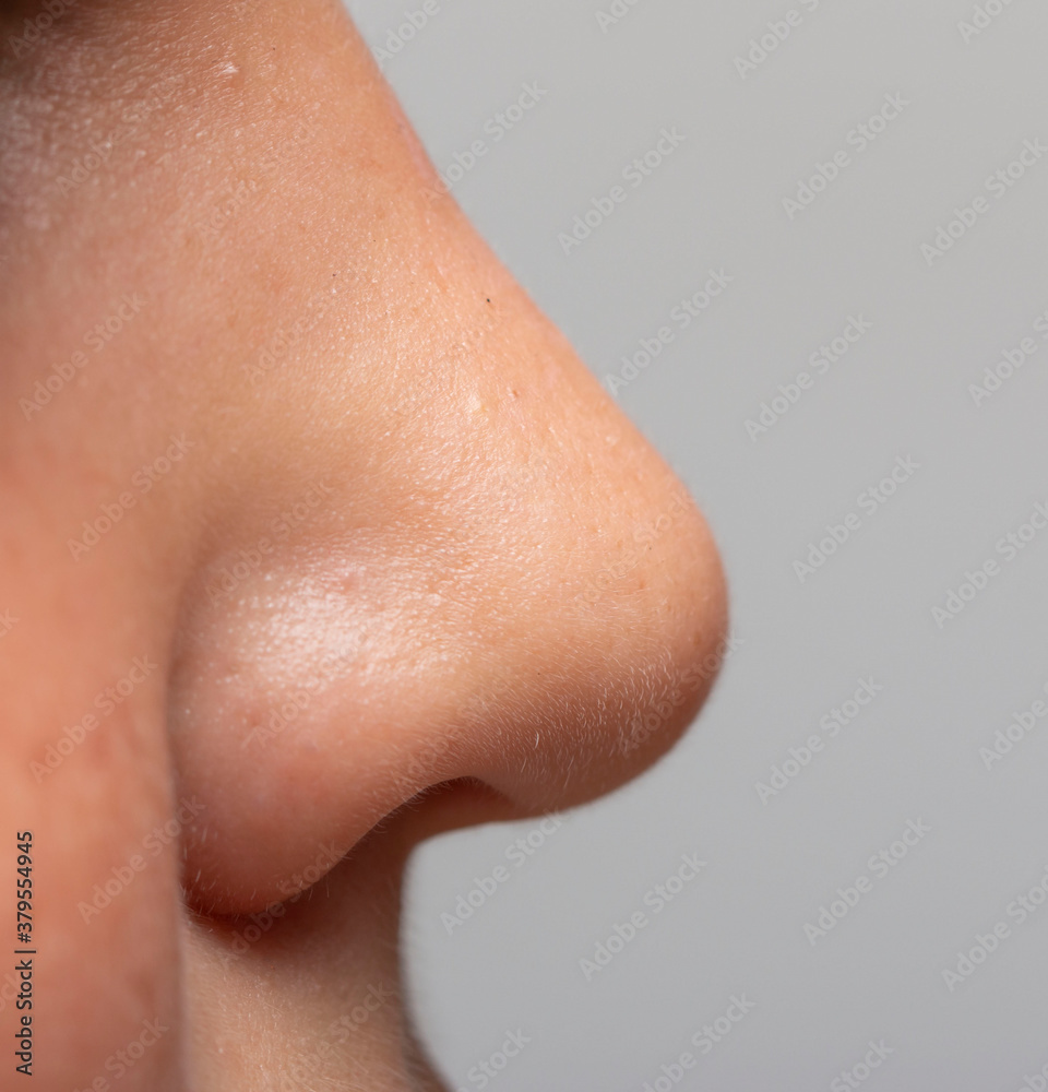 children's nose in profile on a light background children's nose in profile on a light background