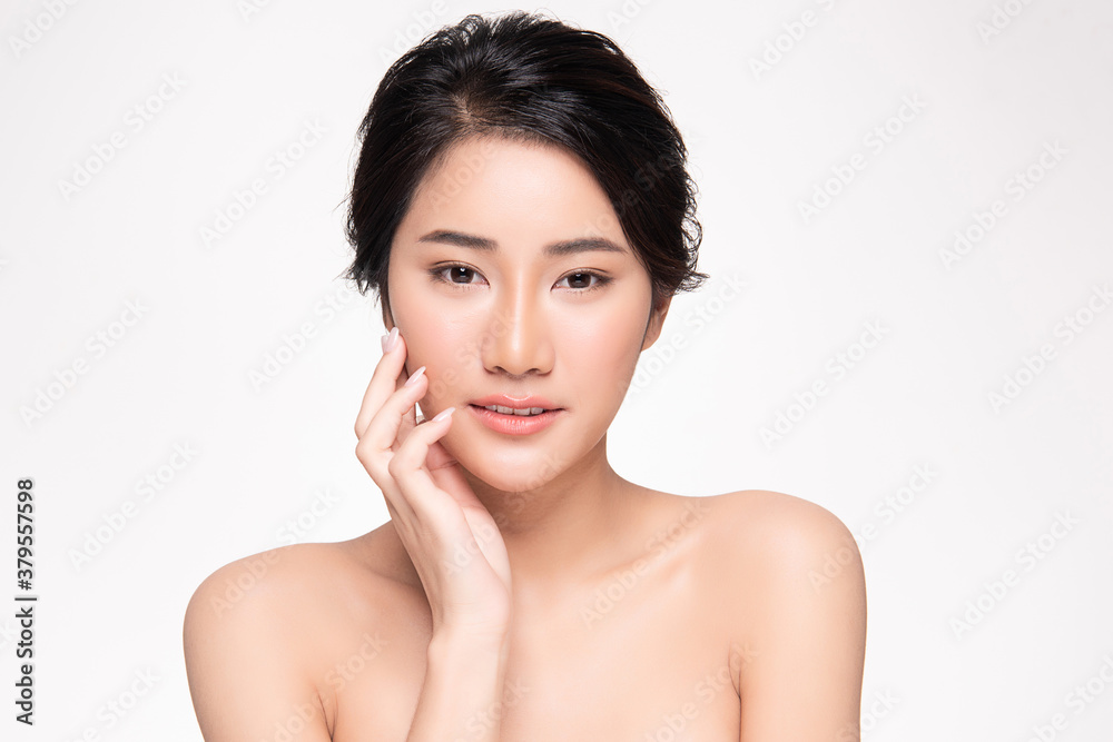 Beautiful young asian woman with clean fresh skin on white background, Face care, Facial treatment, Cosmetology, beauty and spa, Asian women portrait Beautiful young asian woman with clean fresh skin on white background, Face care, Facial treatment, Cosmetology, beauty and spa, Asian women portrait