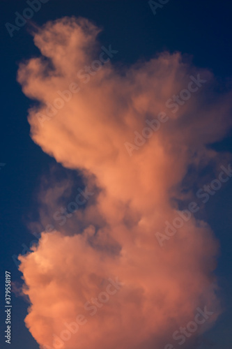 Fire clouds against the blue sky