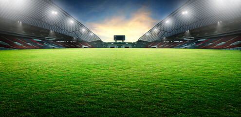 Stickers Stadion Voetbalstadion bij zonsondergang met grasveld  © Image Craft