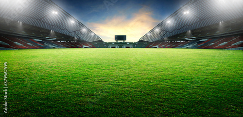 Sunset scene illumination soccer stadium and green grass field. 3D rendering photo