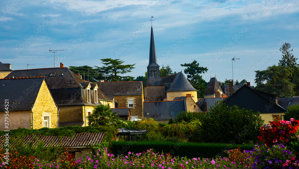 Picturesque view of houses and church of Grez-Neuville commune in Maine-et-Loire department, western France